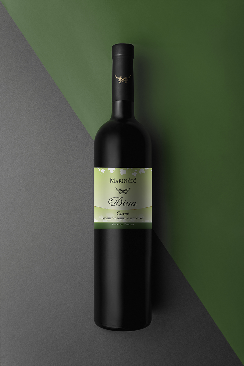 Wine bottle mockup top view Photographed bottle in a studio environment with two different label sizes. Perfect to showcase your wine label design.