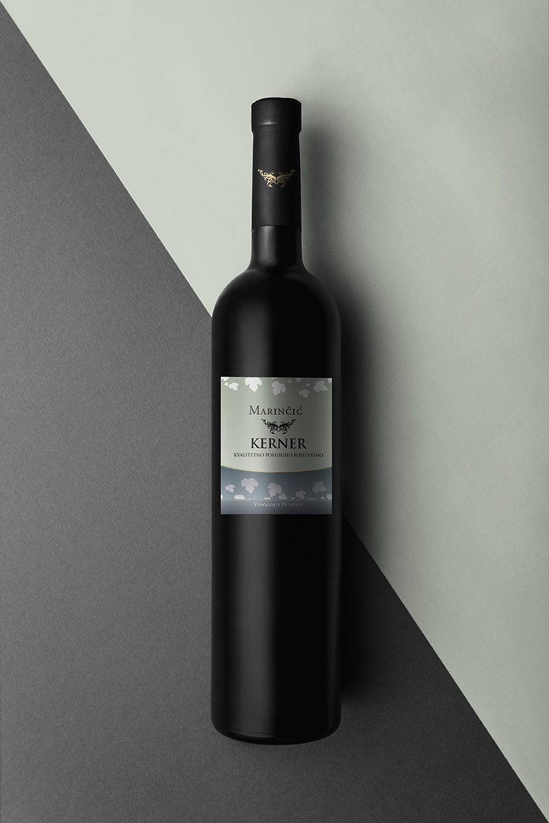 Wine bottle mockup top view Photographed bottle in a studio environment with two different label sizes. Perfect to showcase your wine label design.