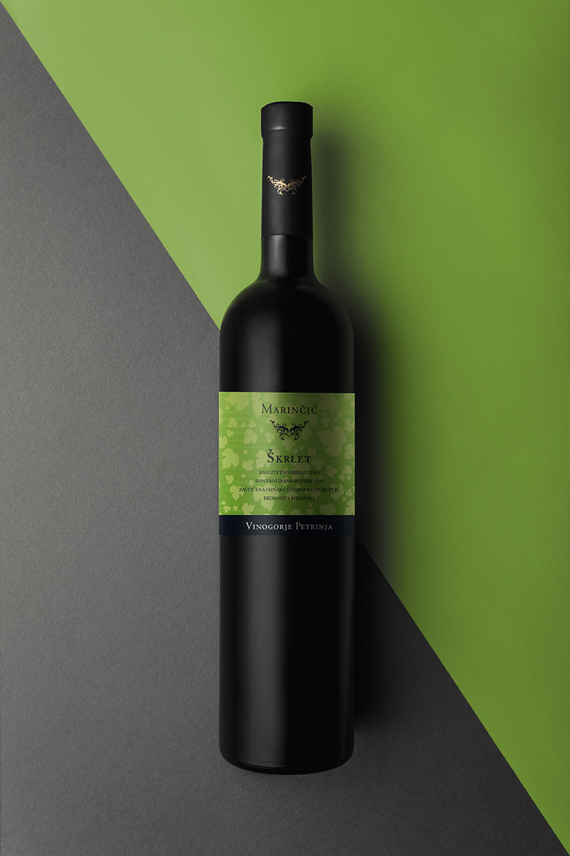 Wine bottle mockup top view Photographed bottle in a studio environment with two different label sizes. Perfect to showcase your wine label design.